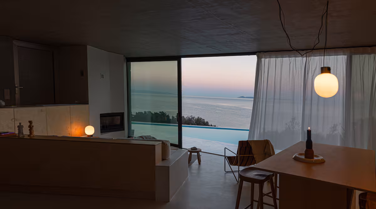 Sunset light across a villa living room, filmed for a walkthrough video